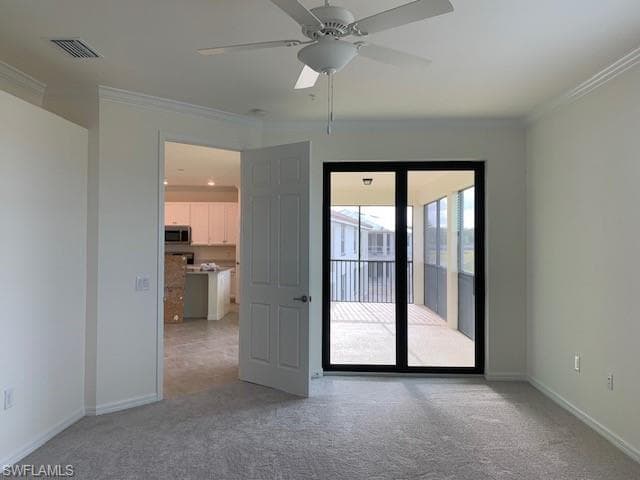 Master bedroom with crown molding and ceiling fan