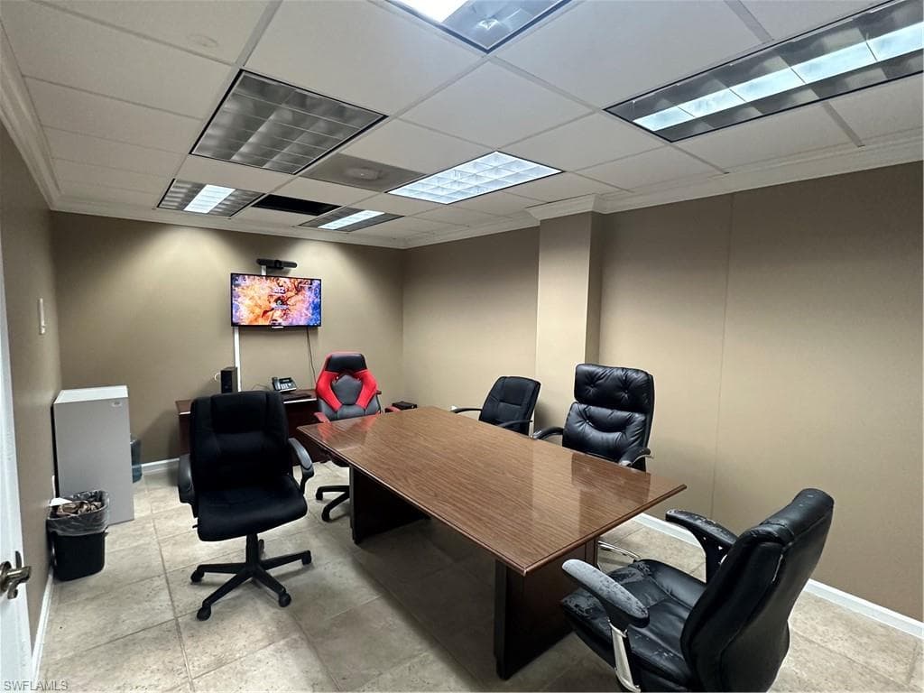 Home office with a drop ceiling