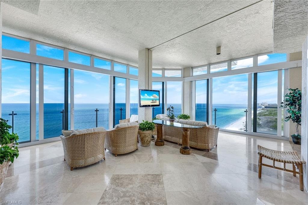 Enclosed balcony with automated electric shutter doors