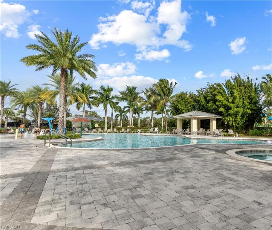 Community Pool with a gazebo and a patio area