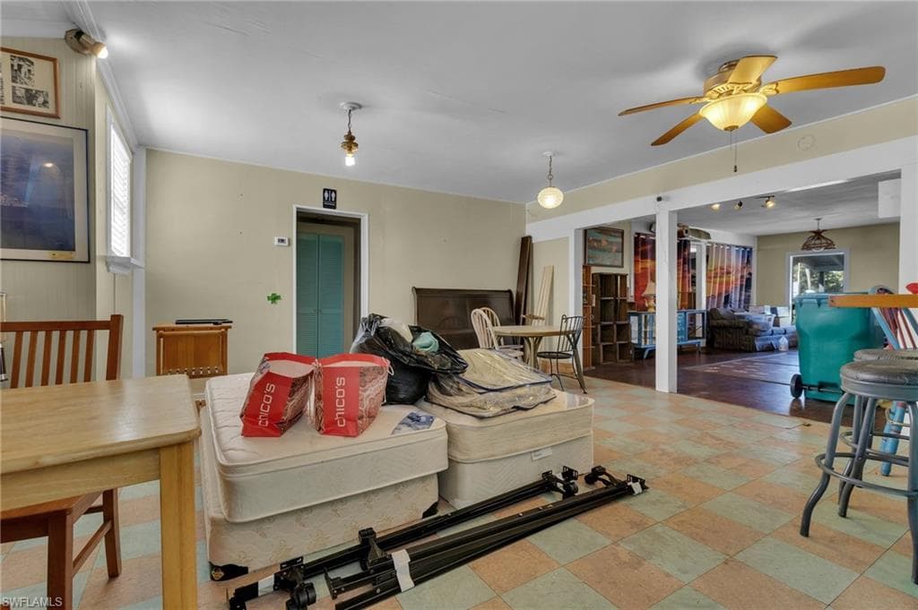 Living area with a ceiling fan