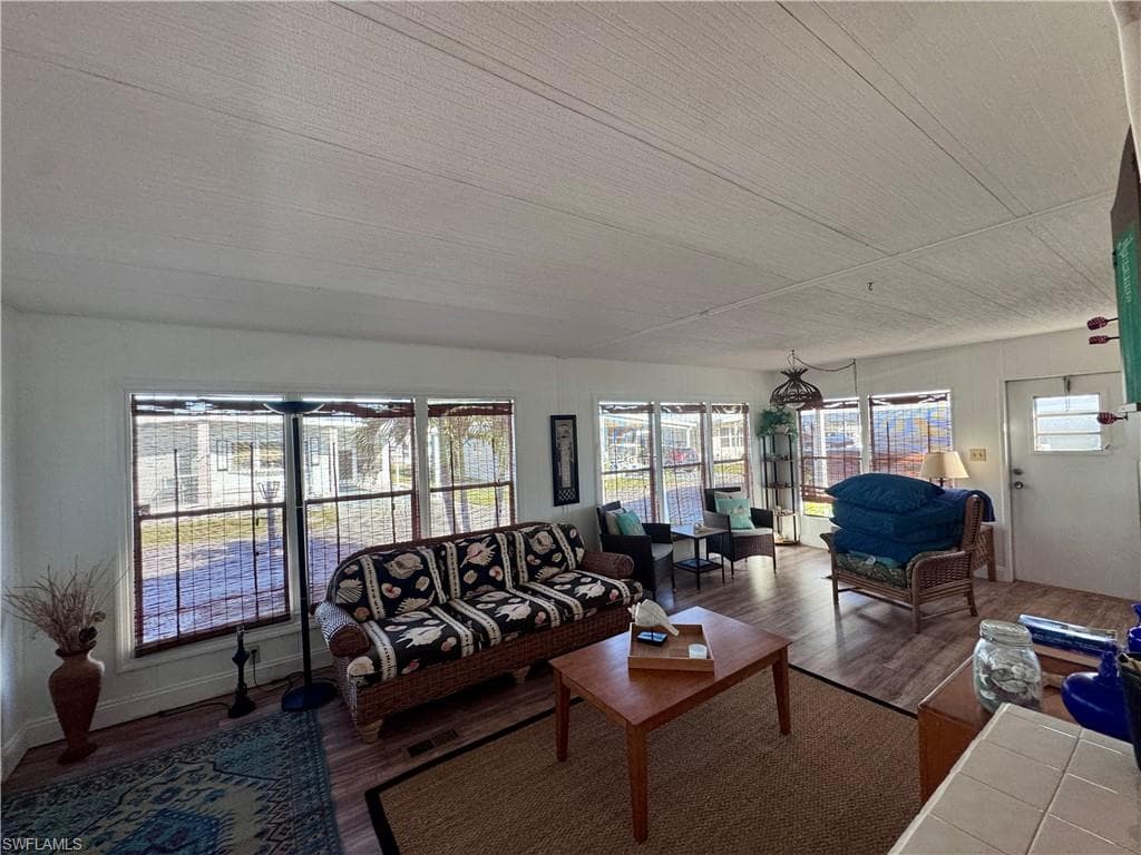 Living room featuring wood finished floors