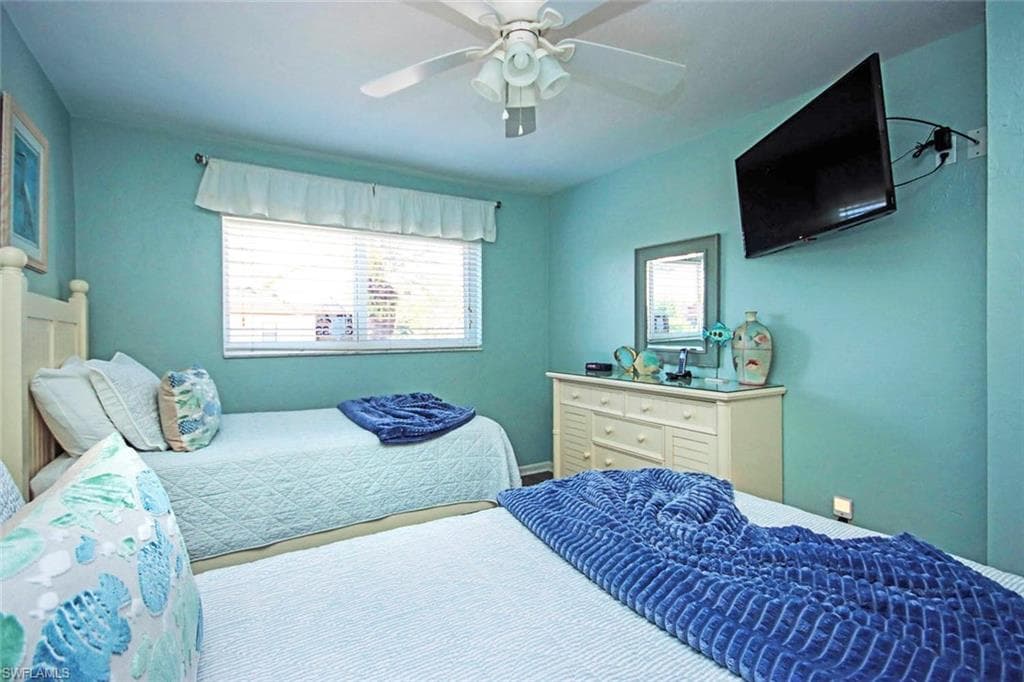 Bedroom featuring ceiling fan