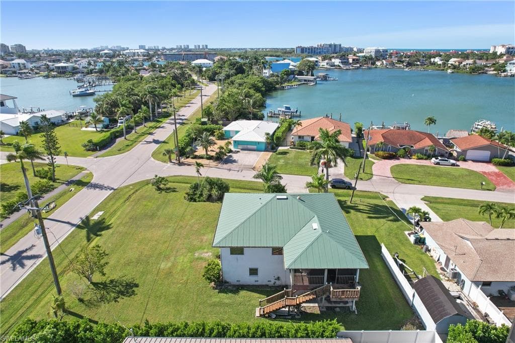 View of urban area with a large body of water and nearby suburban area