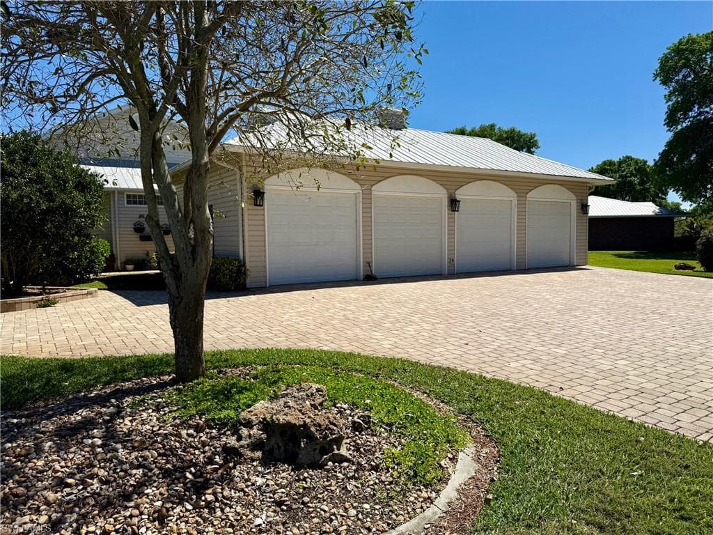 Garage with decorative driveway