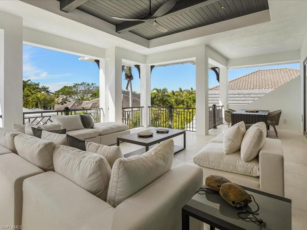 View of patio / terrace featuring an outdoor living space and a ceiling fan