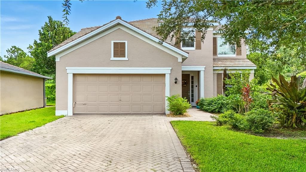 Welcome to this charming single-family home in Southwest Florida, offering great curb appeal with a well-maintained exterior, lush landscaping, and a spacious two-car garage. The inviting front entry sets the tone for the rest of the property, blending comfort and style. Located in a desirable neighborhood, this home provides easy access to local schools, shopping, dining, and Gulf Coast beaches, making it ideal for year-round living or a seasonal retreat.