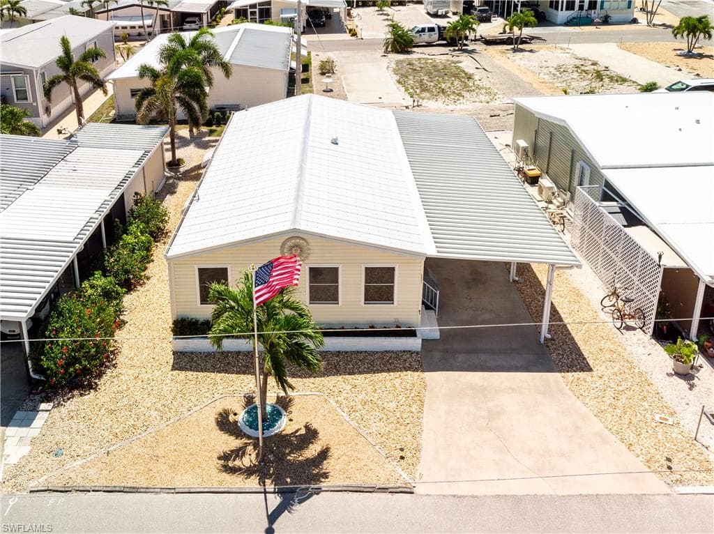 Birds eye view of property with a residential view
