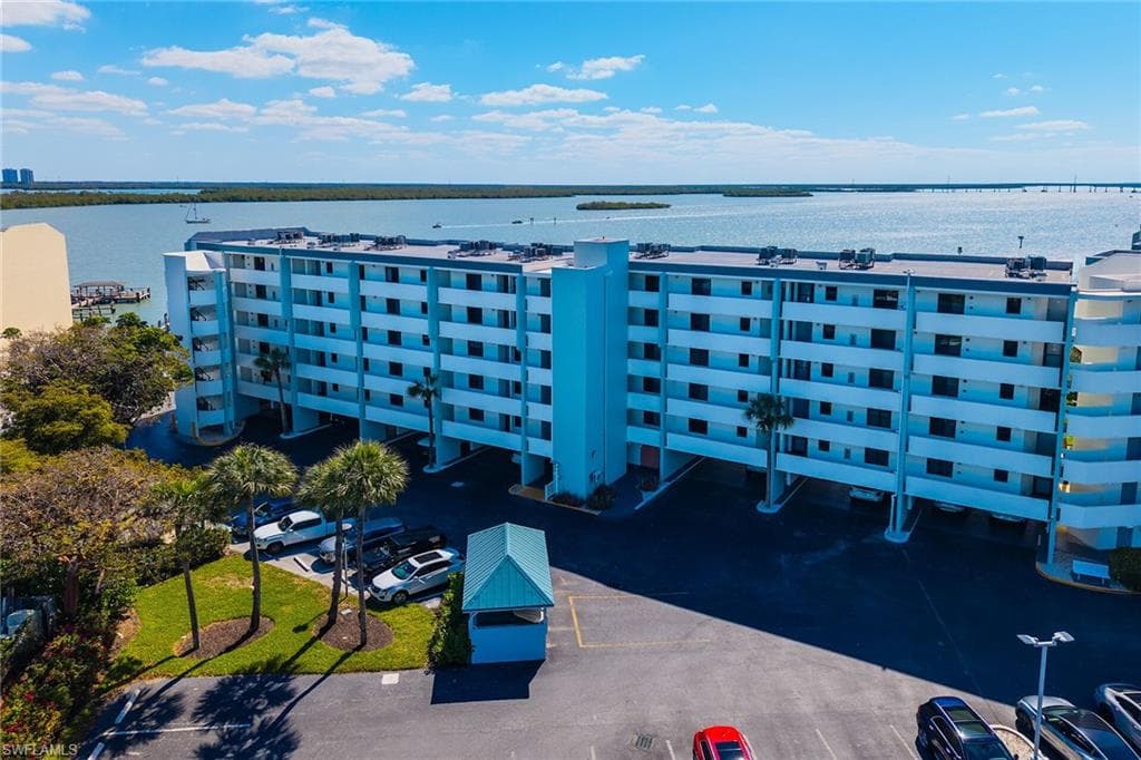 Aerial view featuring a water view