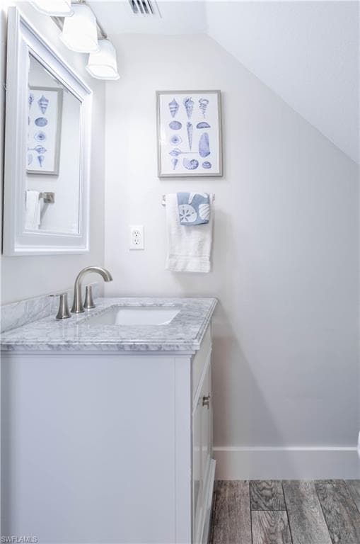 Bathroom with lofted ceiling