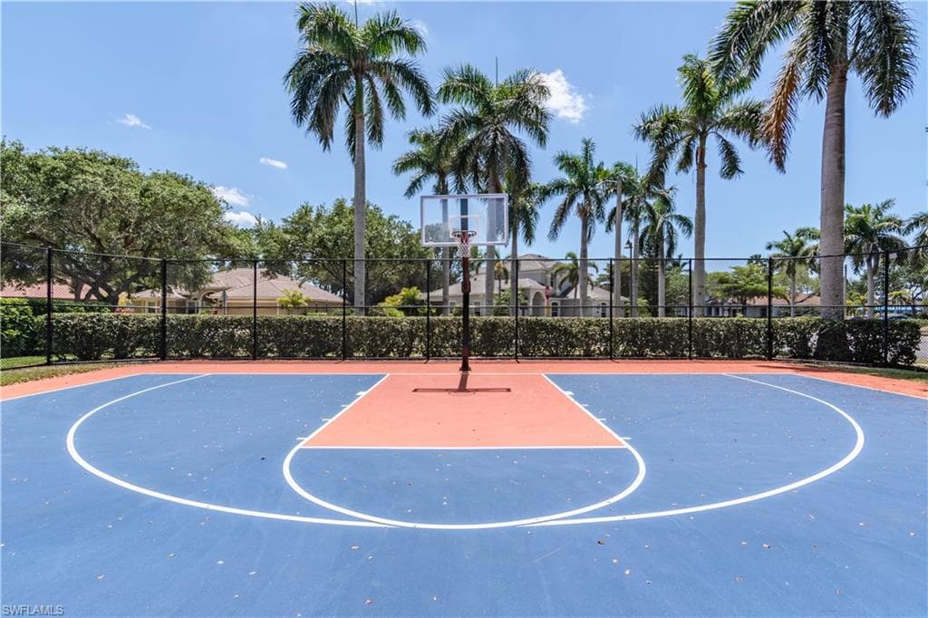 View of sport court with community basketball court and fence