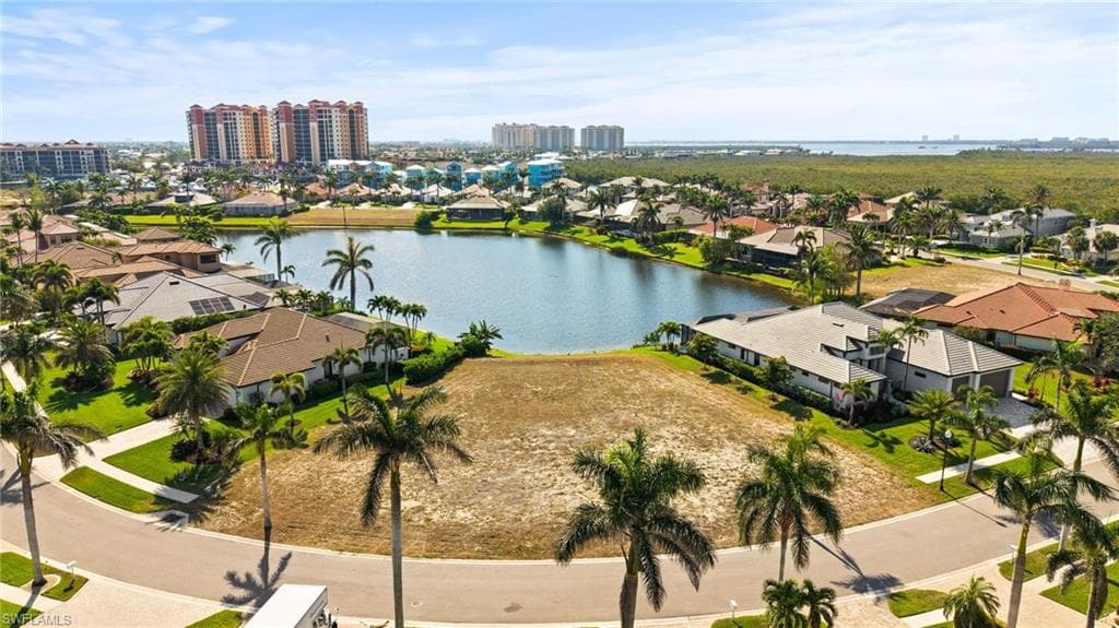 Birds eye waterfront view of property