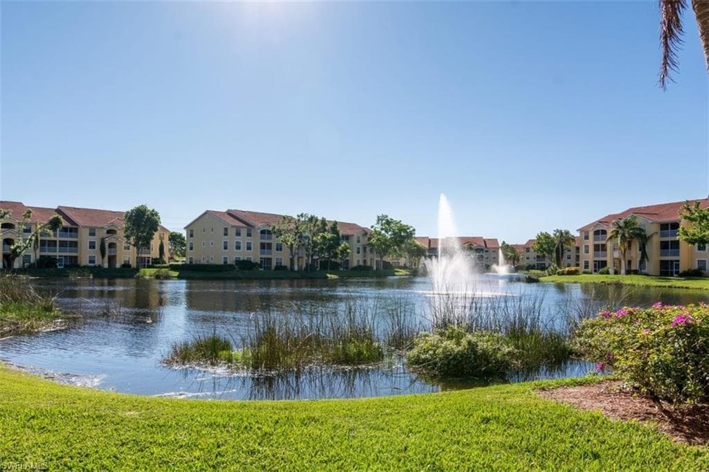 Water view with nearby suburban area