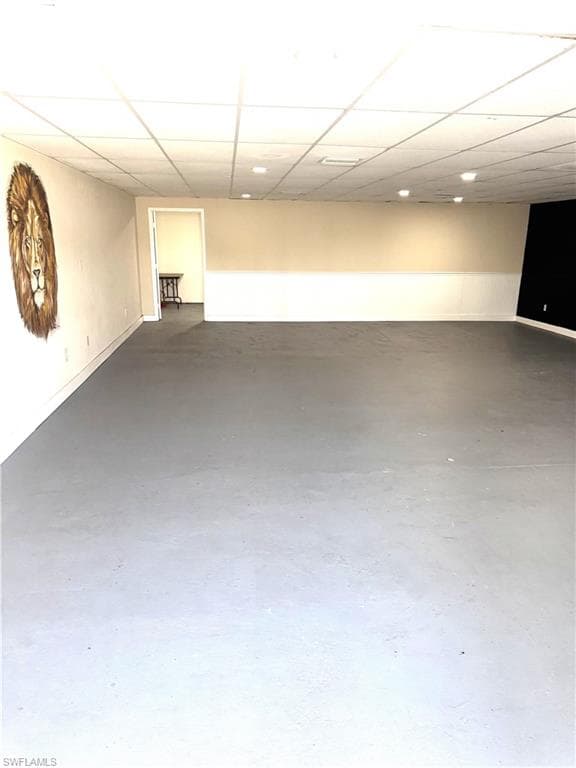 Finished basement with a drop ceiling