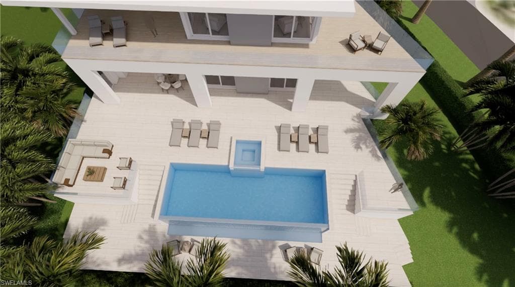 View of subject property with a pool area