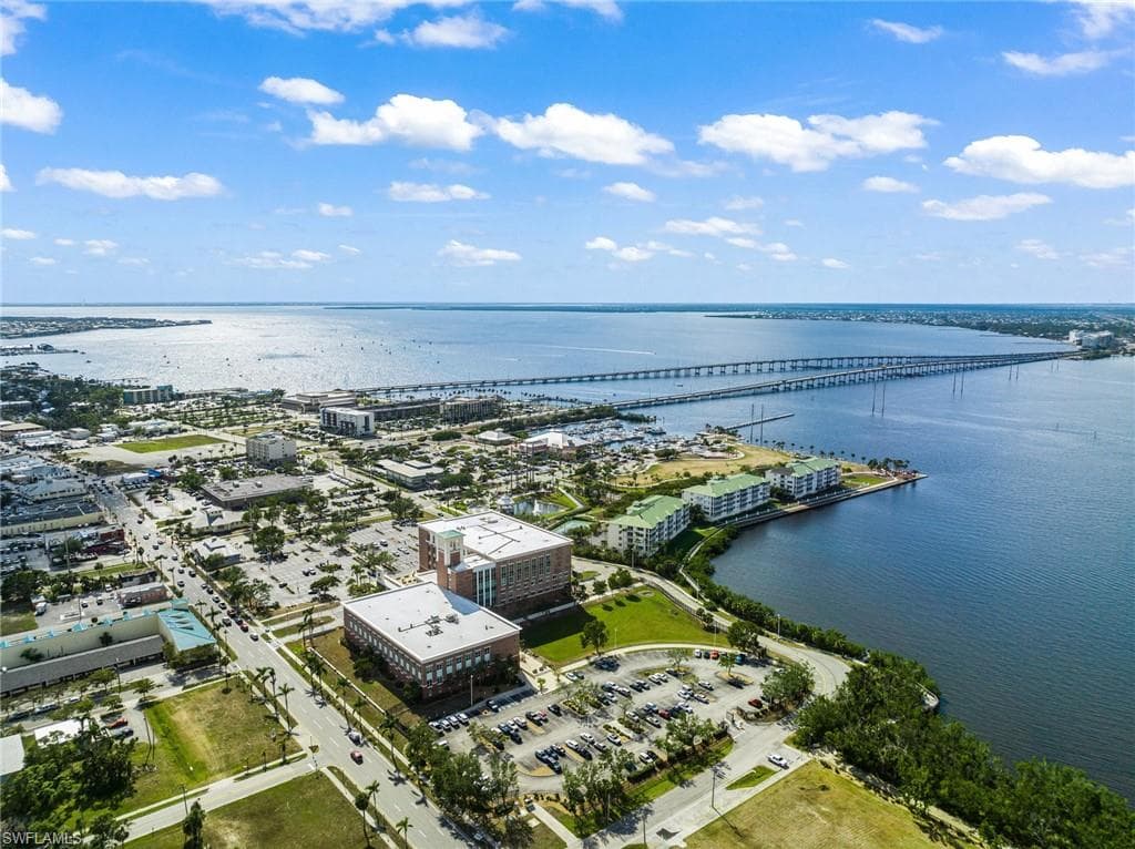 Drone / aerial view of a notable bridge and a nearby body of water