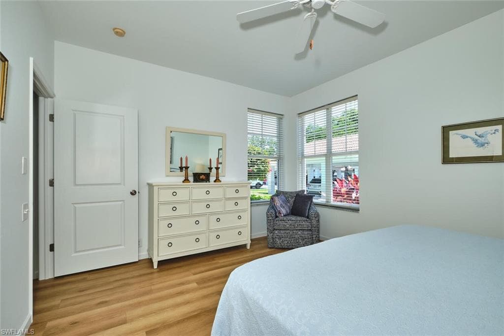 Bedroom featuring light wood-style flooring and ceiling fan