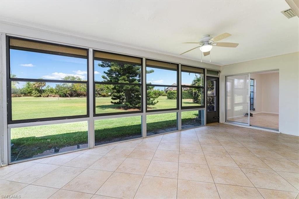 Large Indoor Lanai Living Space with view of Golf Course