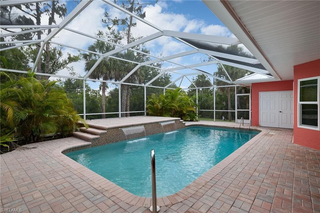 Outdoor pool with a patio