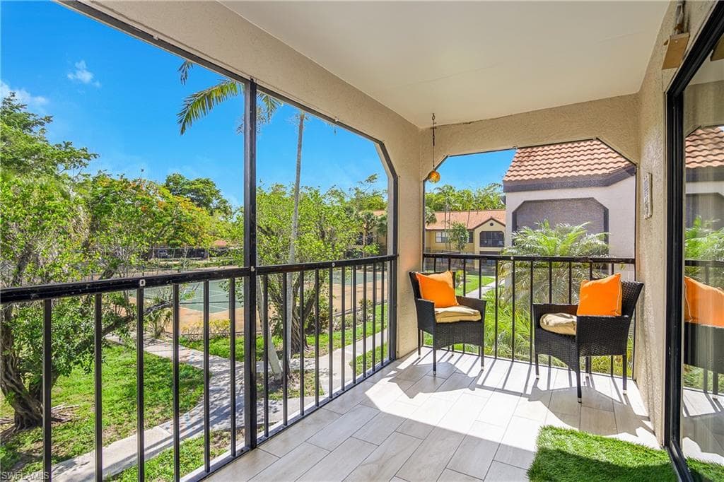 Tiled Lanai with Tennis Court View