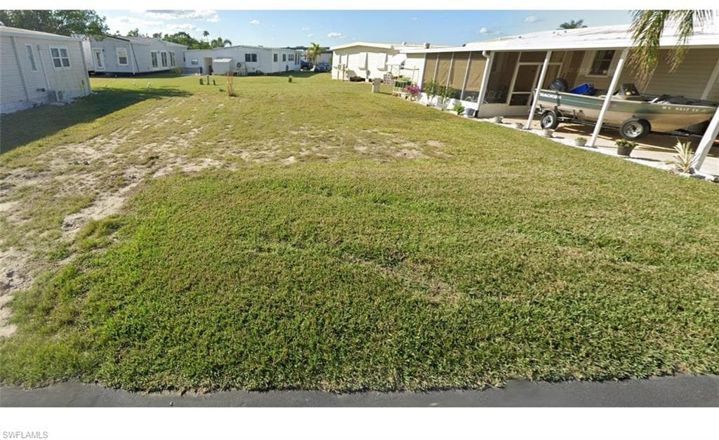 Lot is positioned directly across the street from water; boat launch nearby