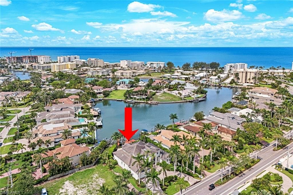 View of property with SW rear exposure, on Compass Pass and Hurricane Harbor, just a moment’s boat ride to the Gulf of America.