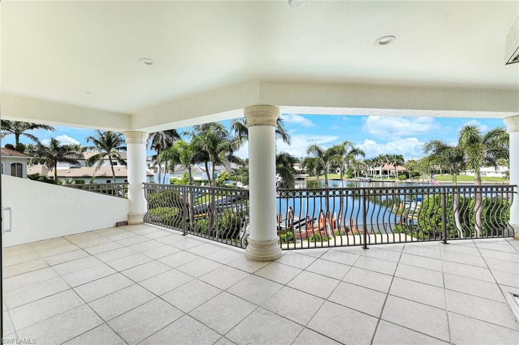 Patio / terrace featuring a water view