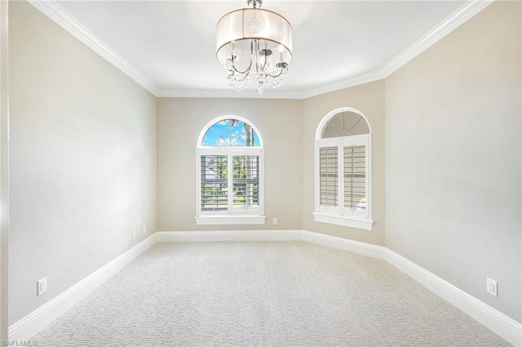 Upstairs Bedroom #5 room featuring ornamental molding, a chandelier, fresh carpet, walk in closet, full bath.