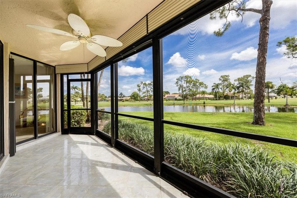 Unfurnished sunroom featuring a gulf & water view