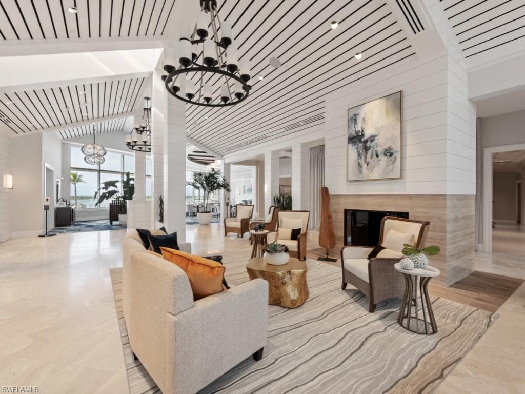 Lobby featuring high vaulted ceiling