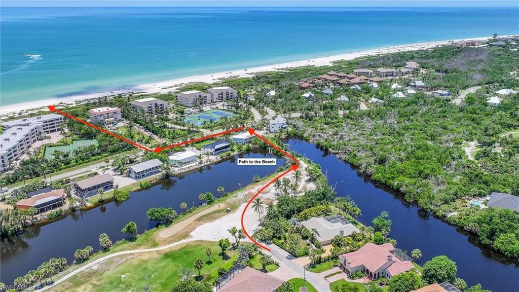 Aerial view of property's location with extended coastline