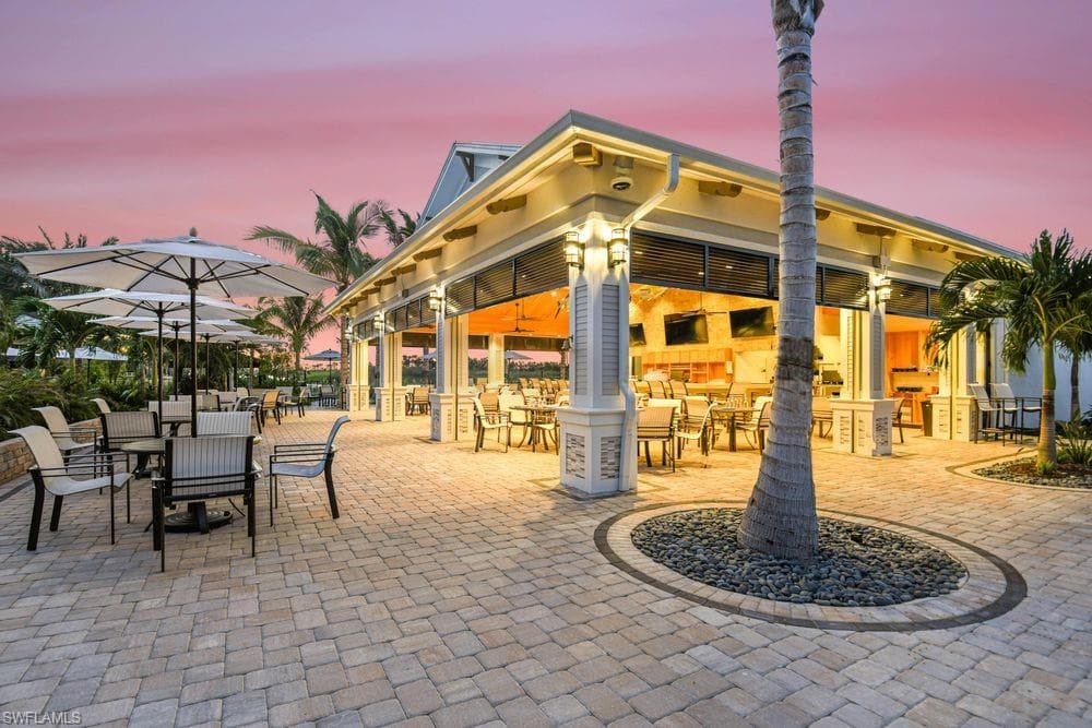 Patio terrace at dusk with a patio area and outdoor dining space