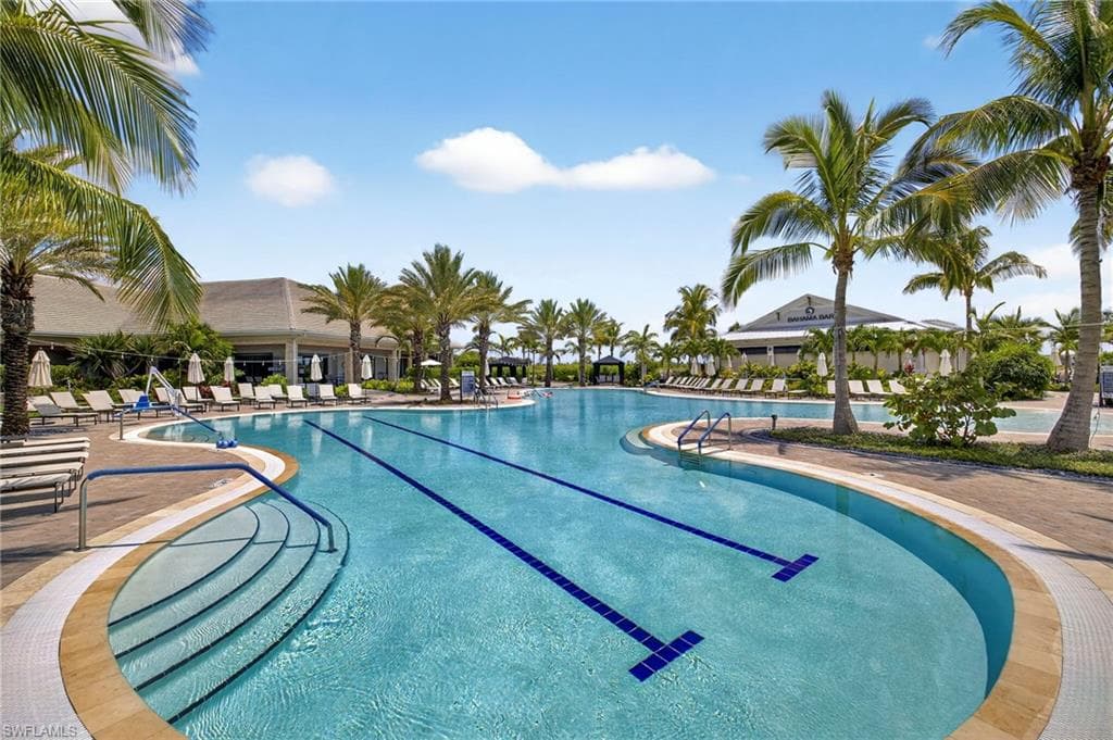 Community pool with a patio area