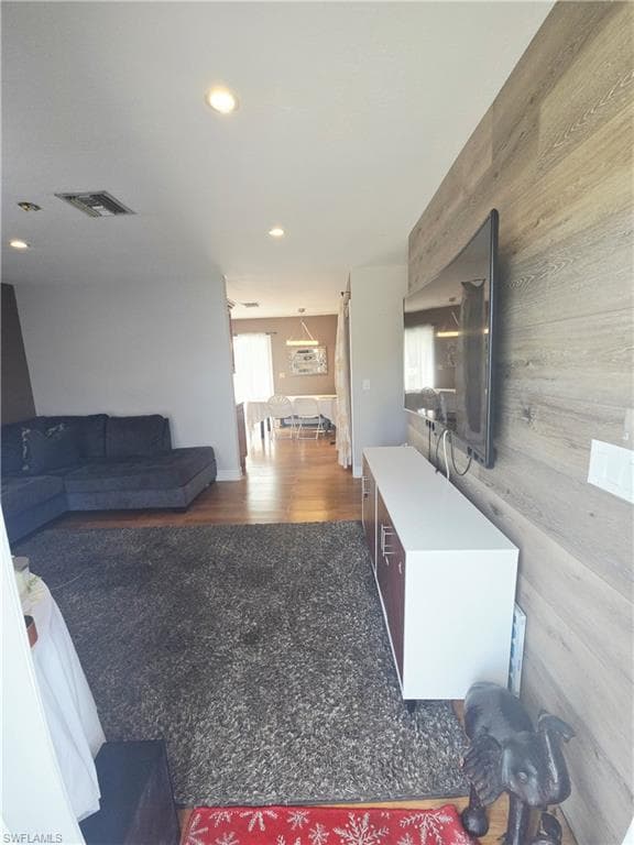 Living area with wooden walls
