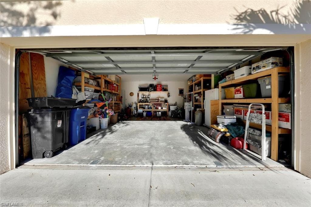 Nice built in shelving in garage.
