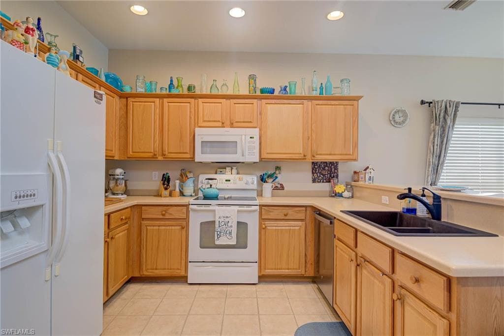 Spacious kitchen with lots of cabinets for storage!