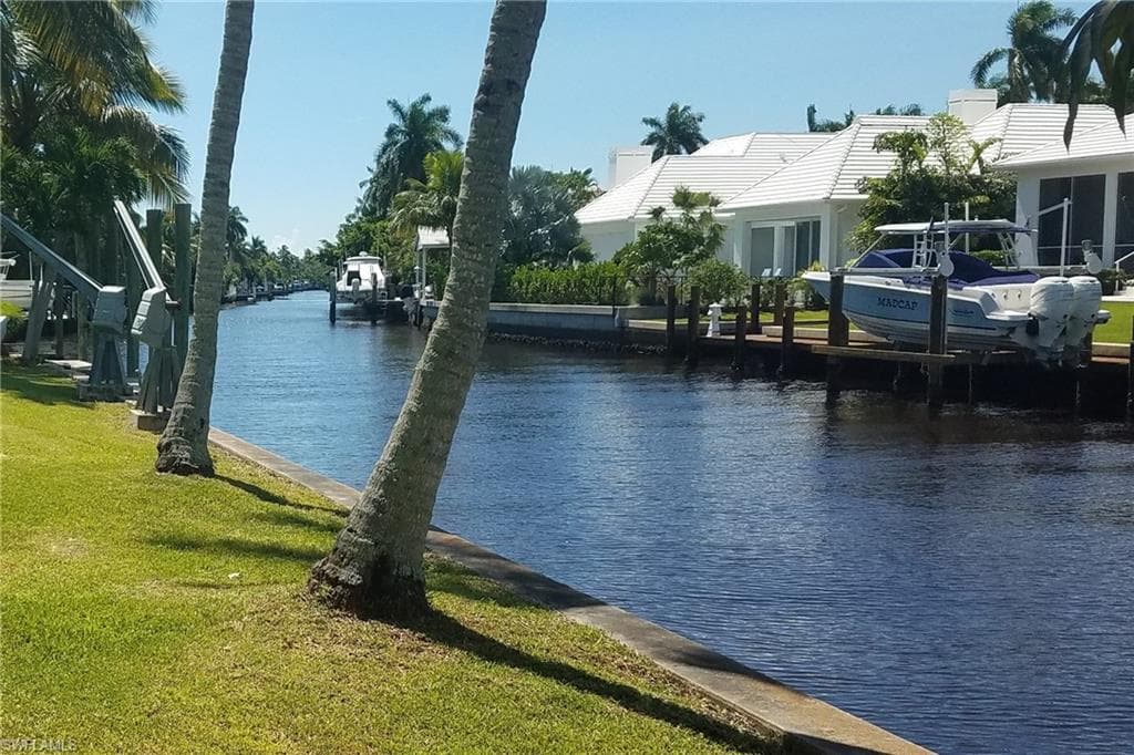 Water view with a boat dock
