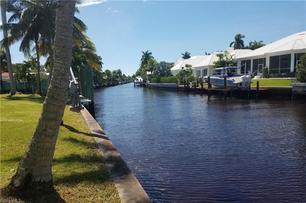 Water view featuring a dock