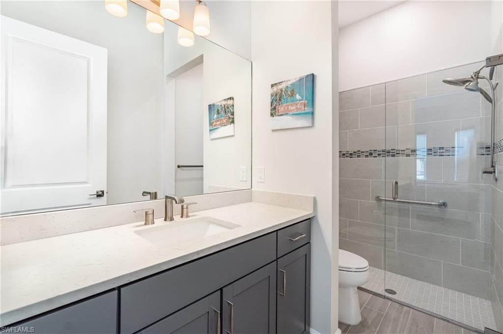 Guest Bedroom ensuite with walk in shower.