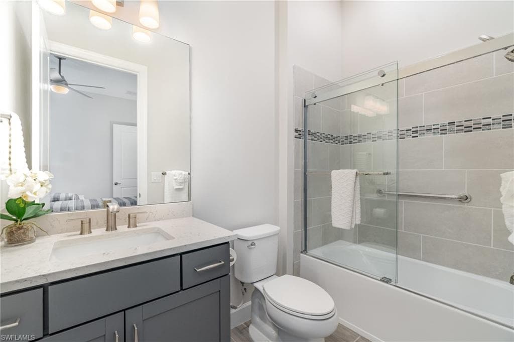 Guest Bedroom ensuite with tub/shower combination and upgraded glass shower doors.
