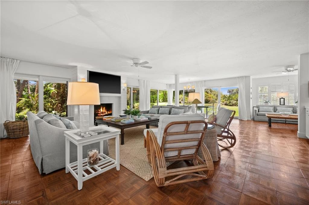 Living area surrounds by hurricane impact sliding glass doors!