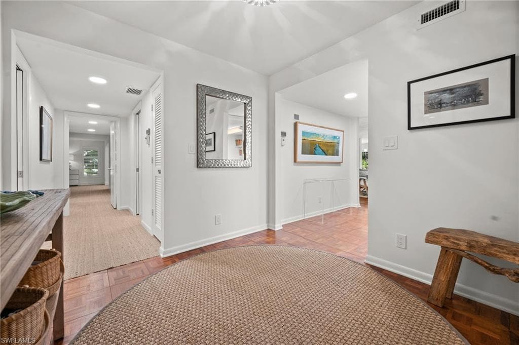 Foyer leads to separate living and bedroom are!