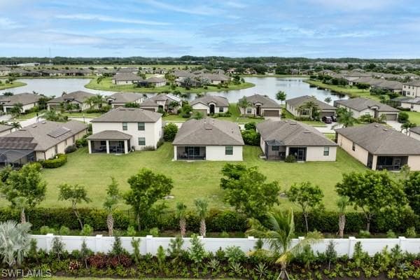 Aerial view of residential area with a large body of water