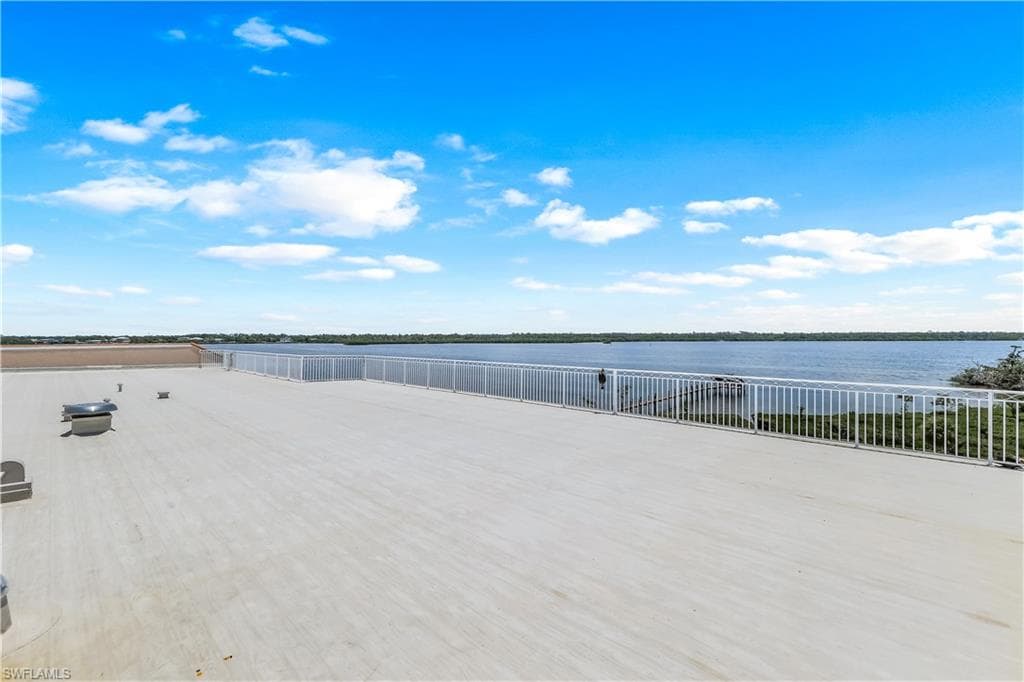 View of rooftop patio / terrace featuring view of Lemon Bay