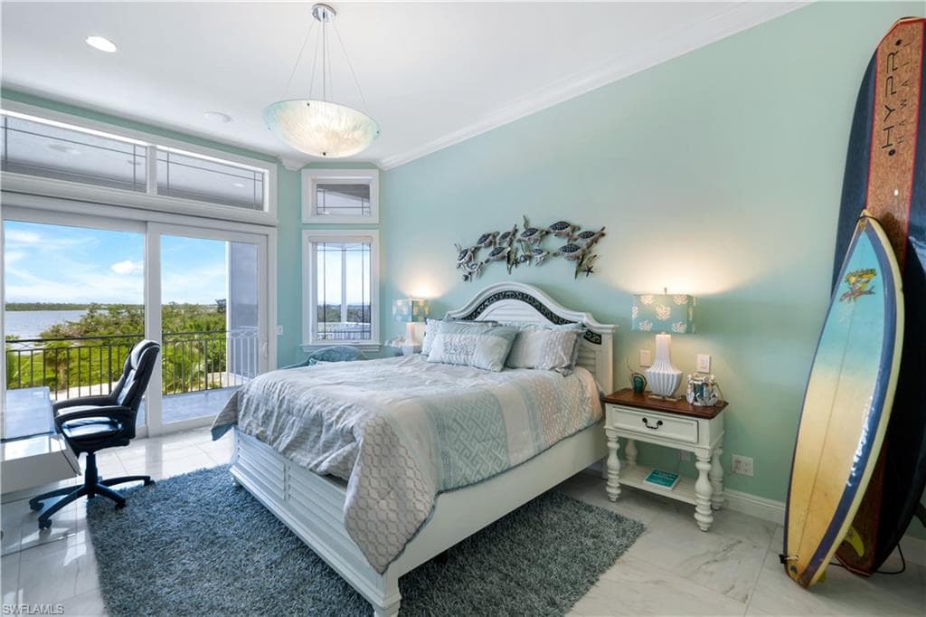 Bedroom with access to exterior, crown molding, recessed lighting, and a water view