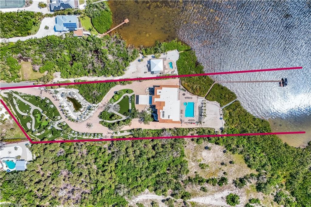 Aerial view of property's location featuring a pool area and property parcel outlined