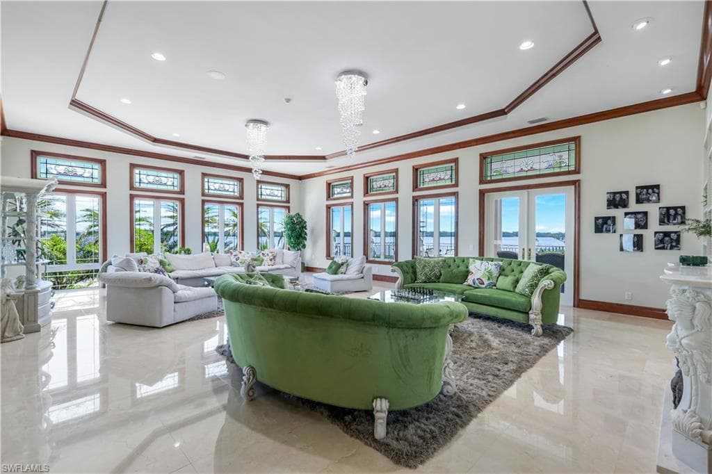 Community lobby with crown molding and recessed lighting