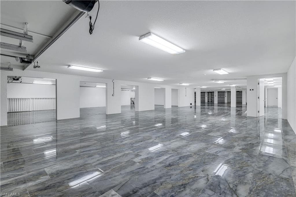 View of garage where you can fit up to 30 vehicles. Vehicle sizes will impact how many can fit.
