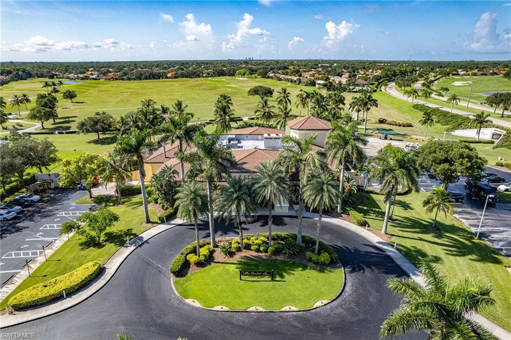 Aerial perspective of suburban area with a golf club