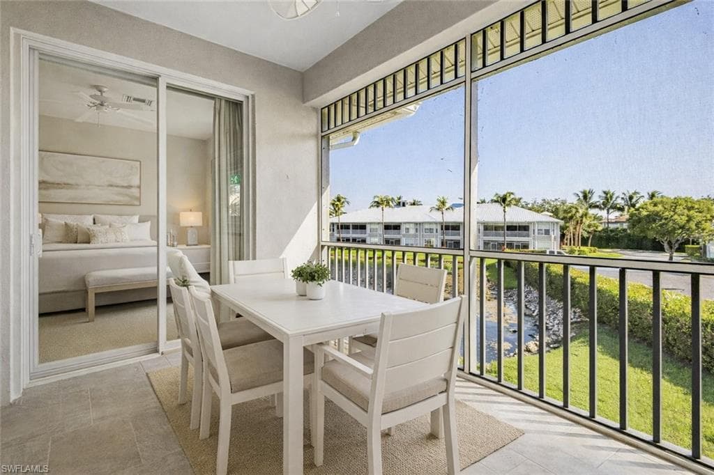 Virtual staged with outdoor dining area and a sunroom